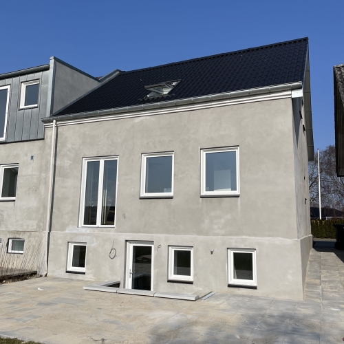Facaderenovering af gråt hus