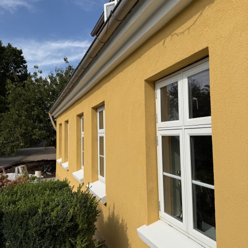 Gult hus facaderenovering